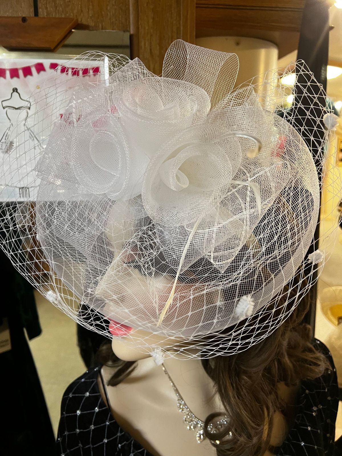 Fascinator in White, veil and roses