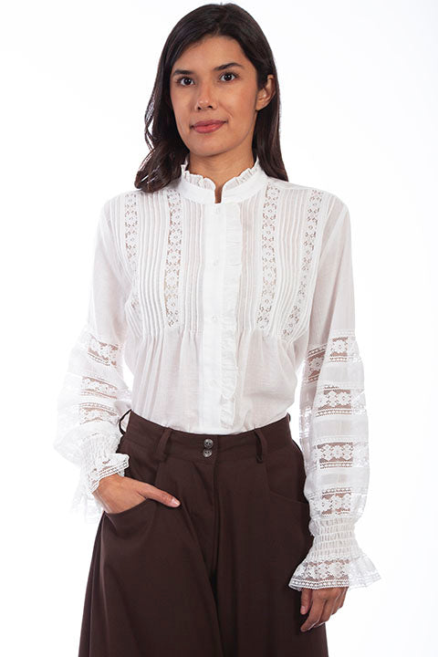 Lace blouse. Lacy bands of floral croche